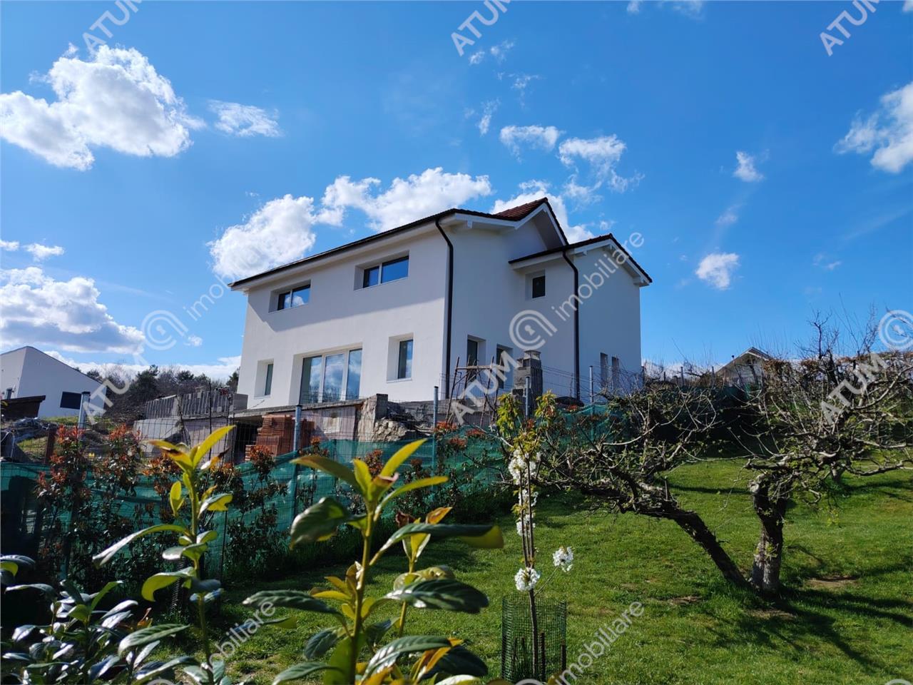 Casa individuala de vanzare 4 camere 2 bai si terasa pe teren 1170 mp in Cisnadioara - Cisnadioara