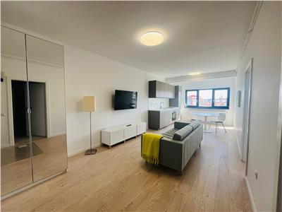 Apartament de inchiriat cu 2 camere decomandate parcare subterna situat in zona Piata Cluj